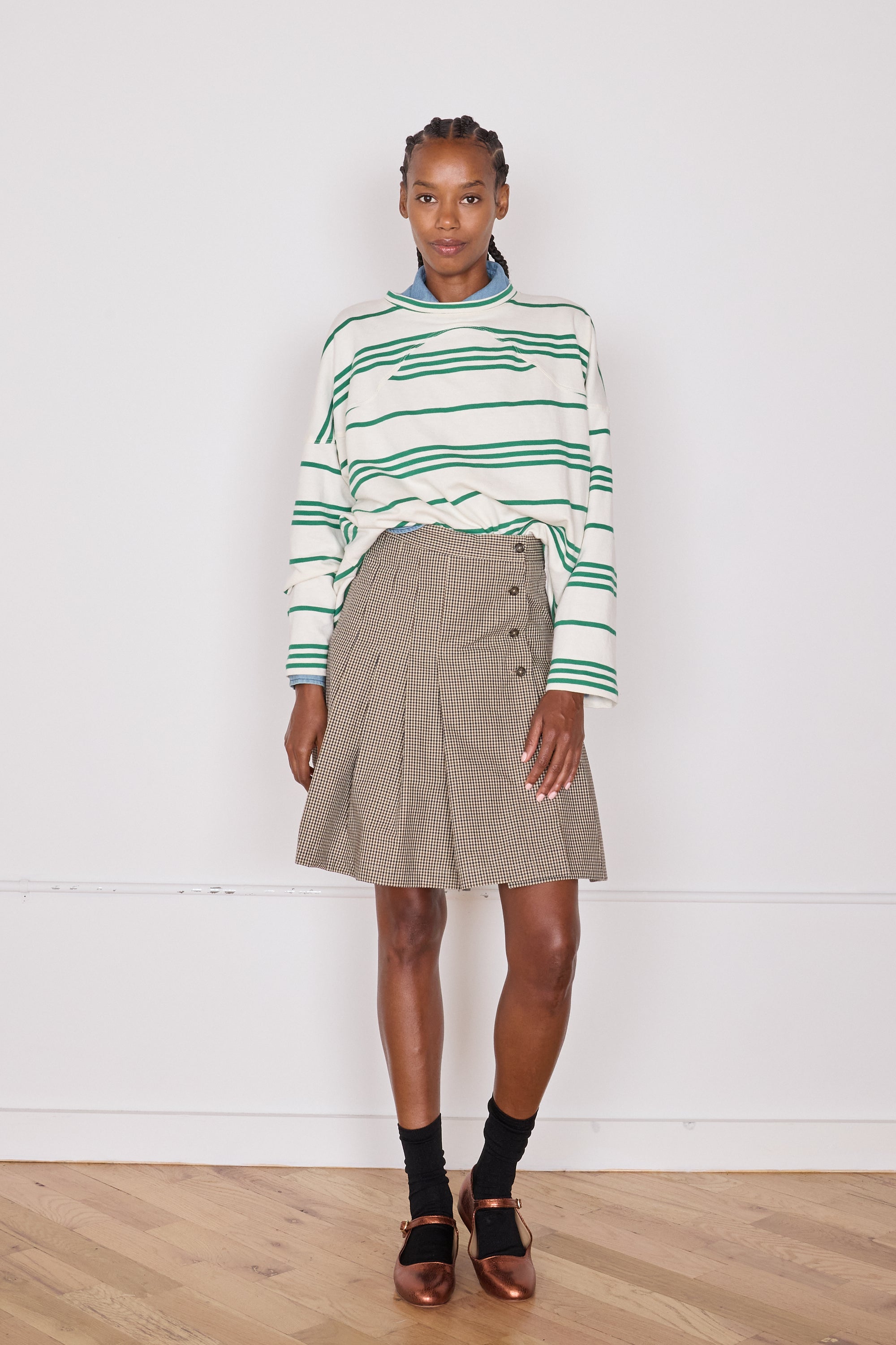 subject wearing mini skirt